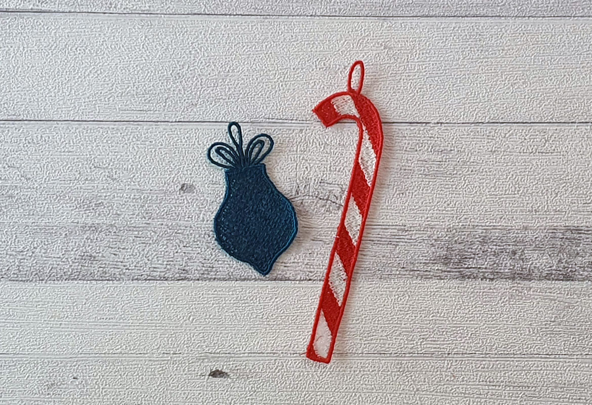 Embroidered blue bauble and candy cane ornaments
