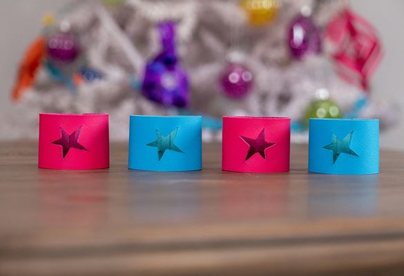 4 bright pink and blue star napkin rings