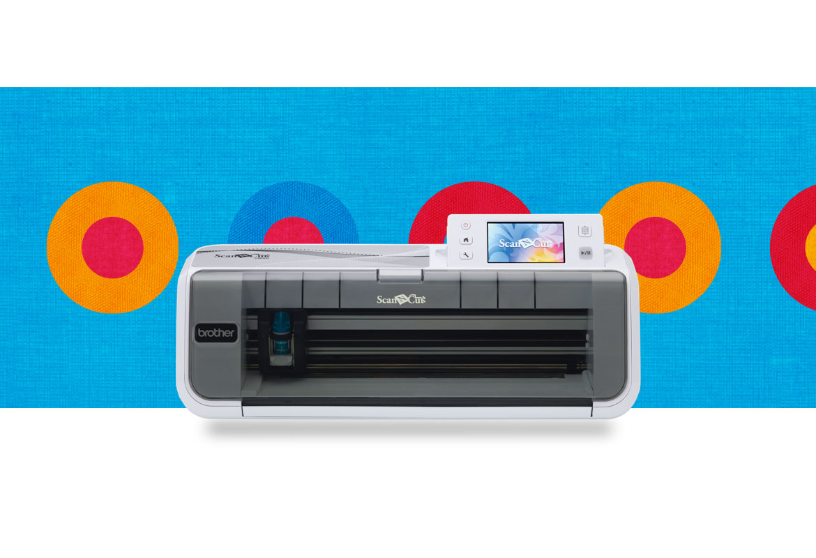 CM300 scancut machine on a blue background with coloured circles