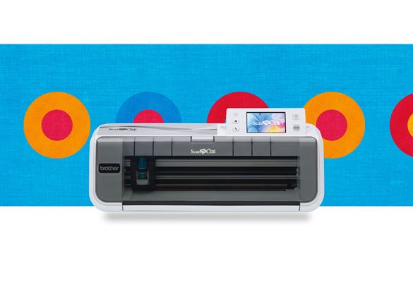 CM300 scancut machine on a blue background with coloured circles