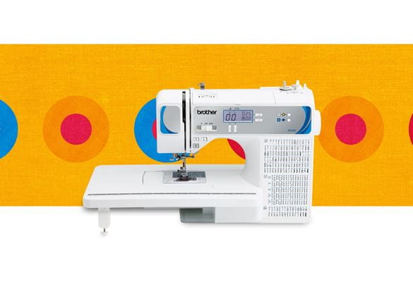 FS210 sewing machine on a multicoloured background