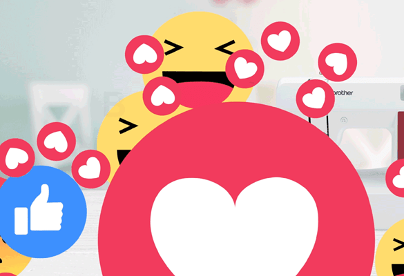 Grands emojis heureux flottant devant la machine à coudre