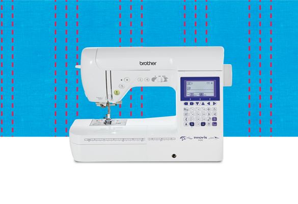 F420 sewing machine on a light blue pattern background