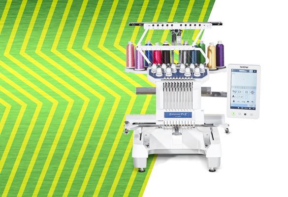 PR1055X embroidery machine on green zigzag background