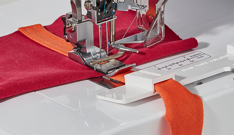 Close up bias tape folder of Brother CV3440/CV3550 coverstitch machine