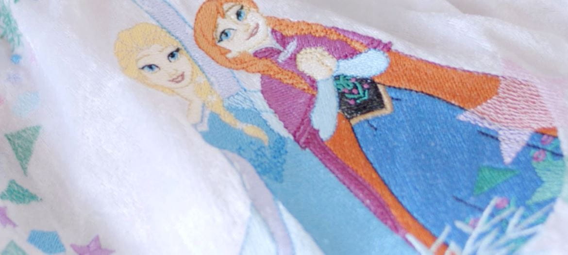 embroidery pattern of two disney princesses