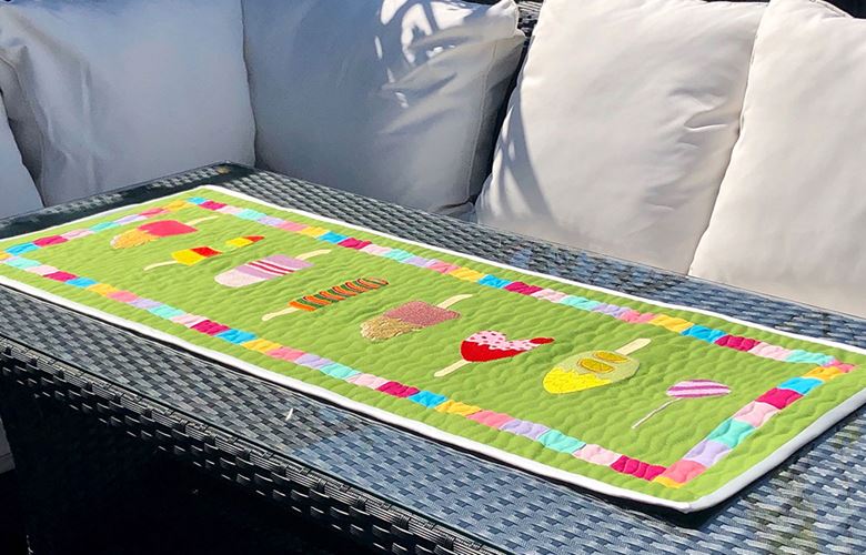 Embroidered ice lollies table runner