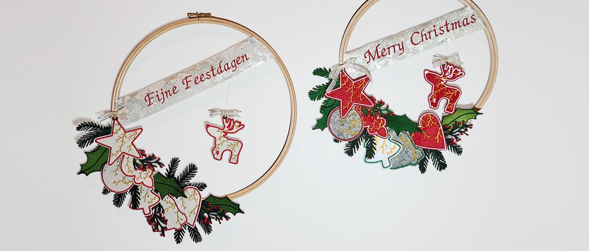 Two embroidered Christmas wreaths