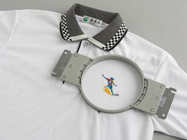Round embroidery frame on polo shirt
