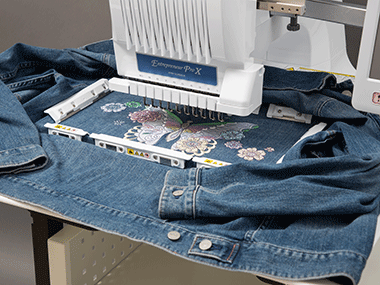 Denim jacket in magnetic frame in PR1055X embroidery machine