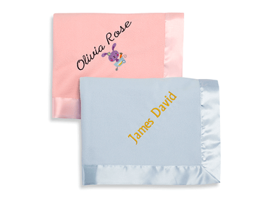 Pink and blue baby blankets embroidered with names