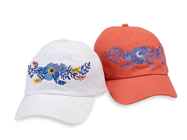 White and orange caps embroidered with flower design