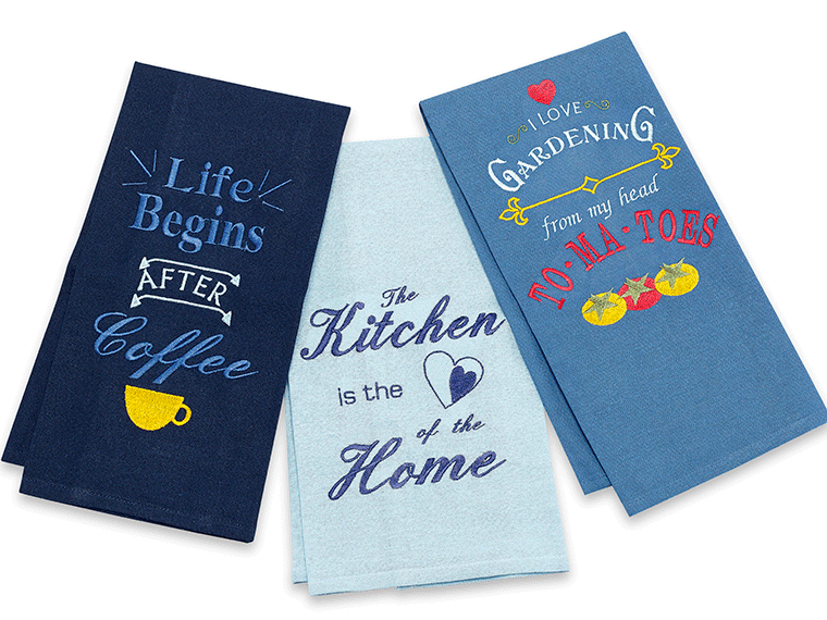Three blue dishcloths with embroidered slogans