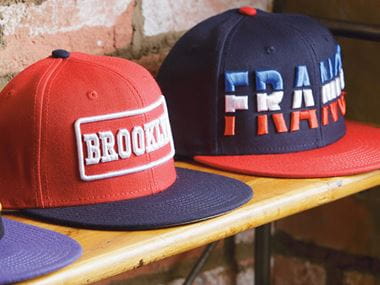 Red and blue embroidered caps