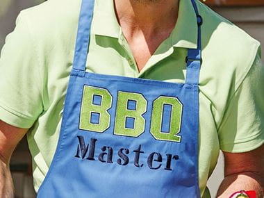 Blue apron with BBQ Master embroidered on