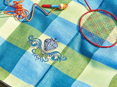 blue and green blanket with air balloon embroidery design