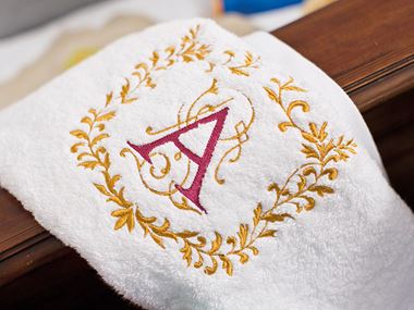 White towel with red A embroidery
