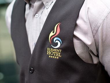 Black waistcoat with large embroidered logo