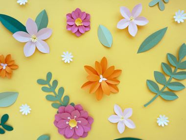 paper cut out plants on a yellow background﻿