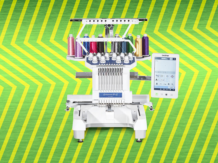 Pr1055X embroidery machine on green zigzag background