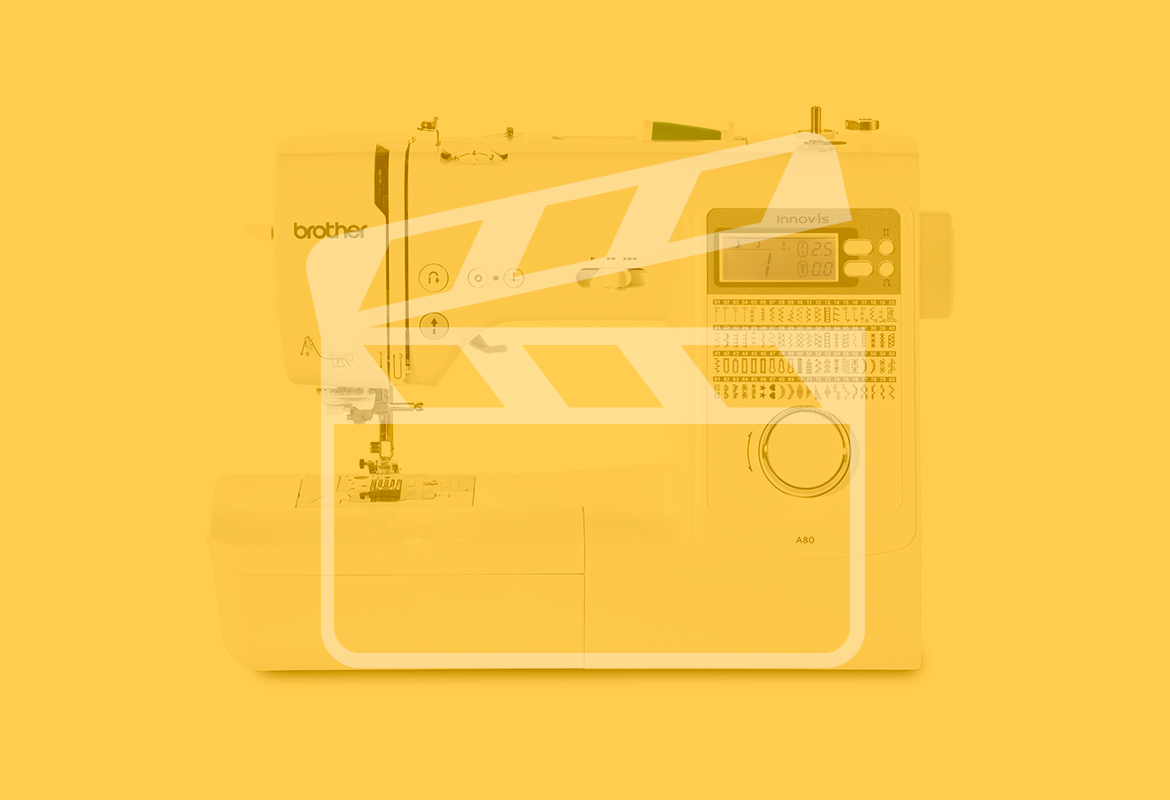 Machine à coudre série A avec transparent rose et icône vidéo