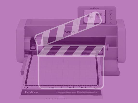 ScanNCut snijmachine met paarse filter en videosymbool