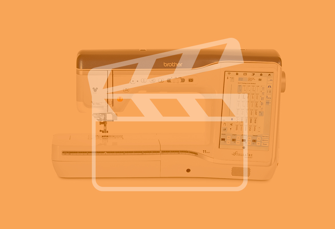 Machine à coudre Stellaire avec transparent sarcelle et icône vidéo