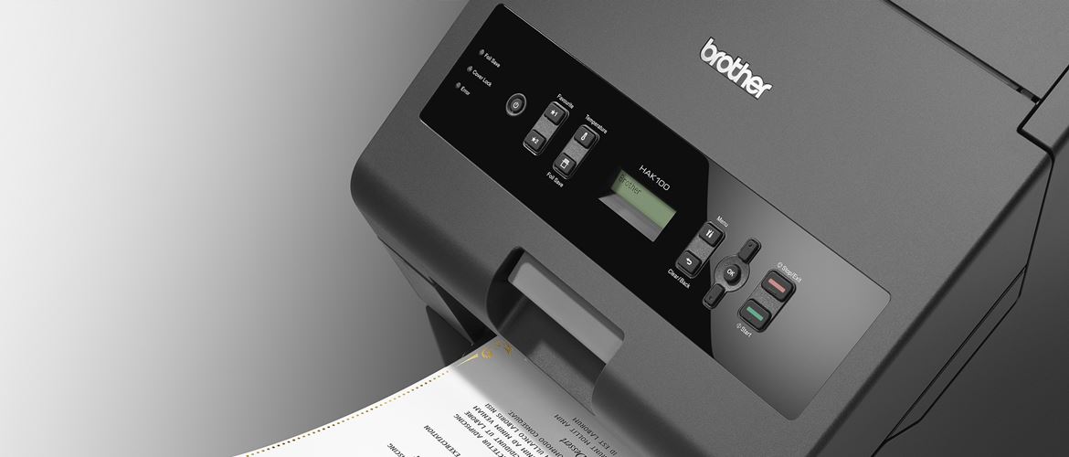 Close-up of HAK-100 hot foil printer with printout