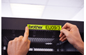 Eredeti Brother TZe-C51 szalag – Fluoreszkáló neon sárga , 24mm széles 4