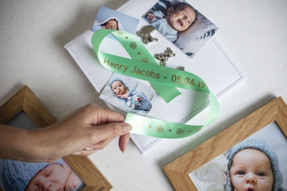 Brother TZe-RM54 satin ribbon tape cassette - gold on mint green - new born baby photo album with the name and date of birth of the baby