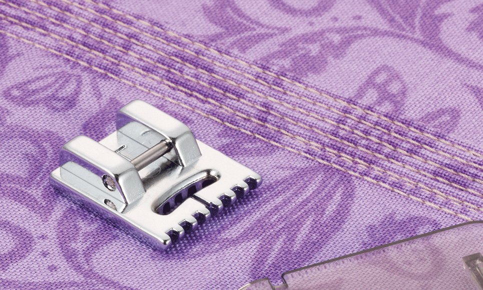 Pin tuck foot with 7 grooves on purple fabric with sewn pin tucks