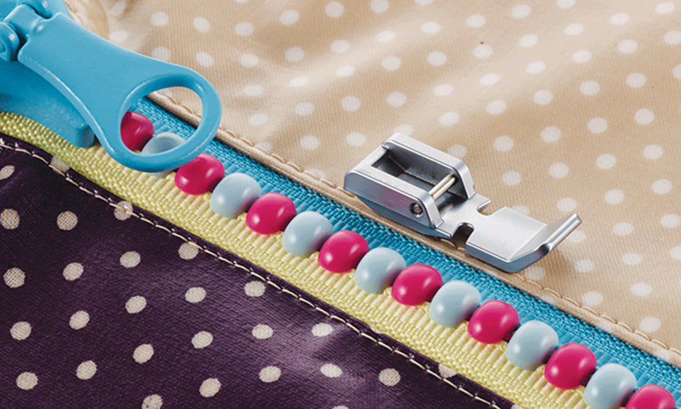 Non-stick narrow zipper foot on polkadot fabric and pink- blue zipper